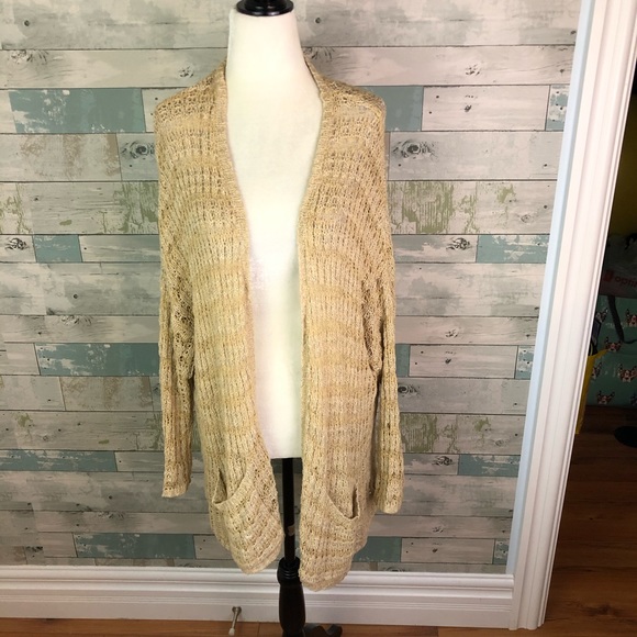 Free people cardigan fits size M/L